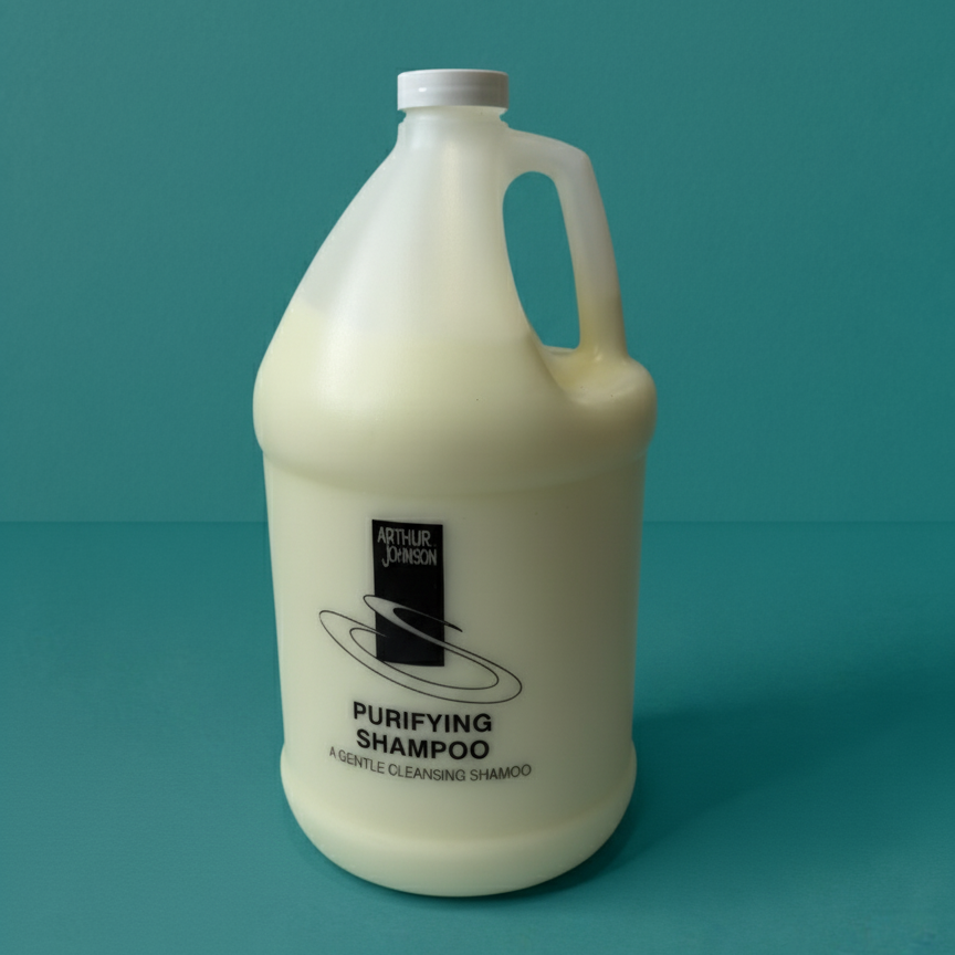 Large bottle of Arthur Jowers Purifying Shampoo on a teal background